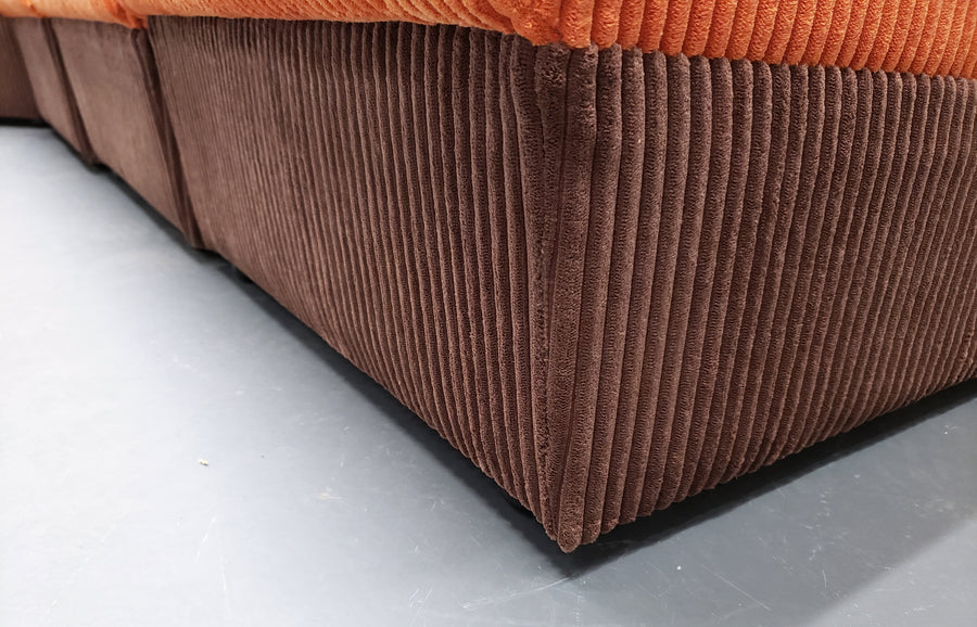 Mid century modular corner sofa in rusty orange corduroy – A rare vintage treasure