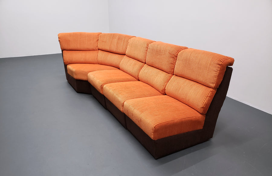 Mid century modular corner sofa in rusty orange corduroy – A rare vintage treasure