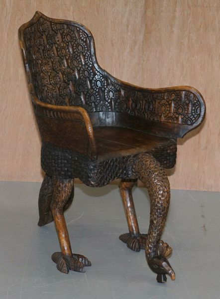 Pair of ornate burmese anglo indian hand carved circa 1880 peacock armchairs – A rare vintage treasure